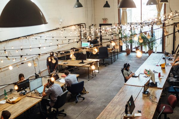 How can investors benefit from the increased demand for co-working spaces in London?